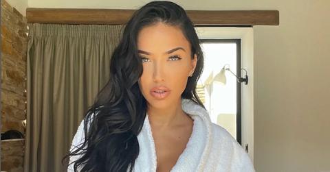 Bre Tiesi is a white robe.