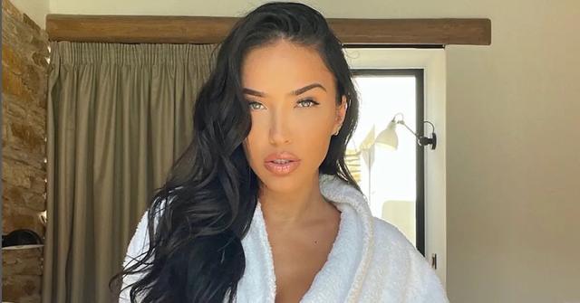 Bre Tiesi is a white robe.