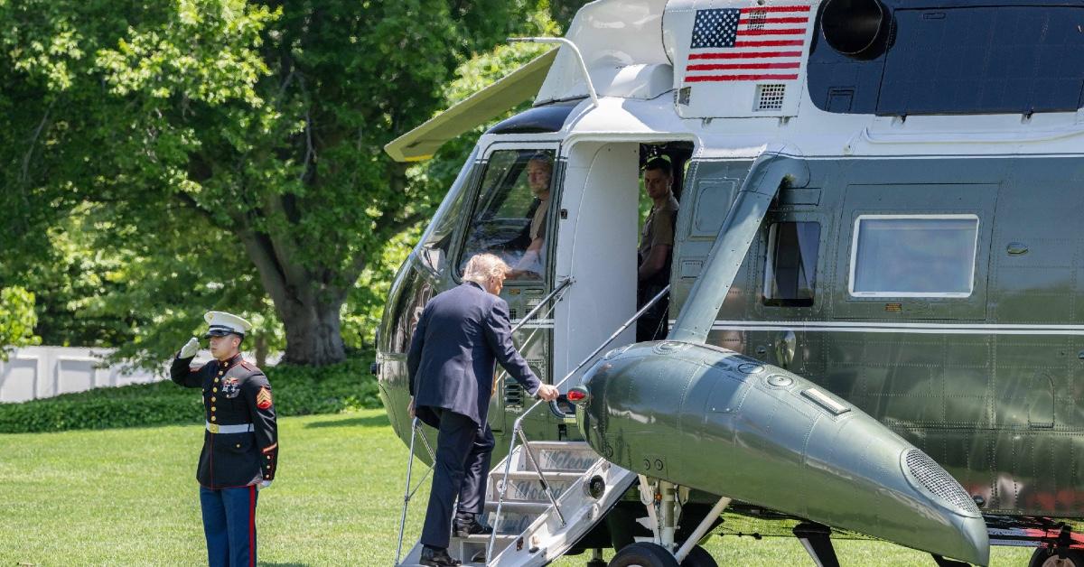 President Donald Trump going up the helicopter