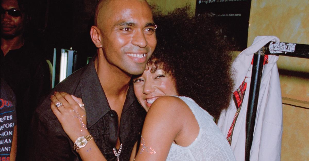 Mel B with her husband, Dutch dancer Jimmy Gulzar, at a Julien MacDonald fashion show.