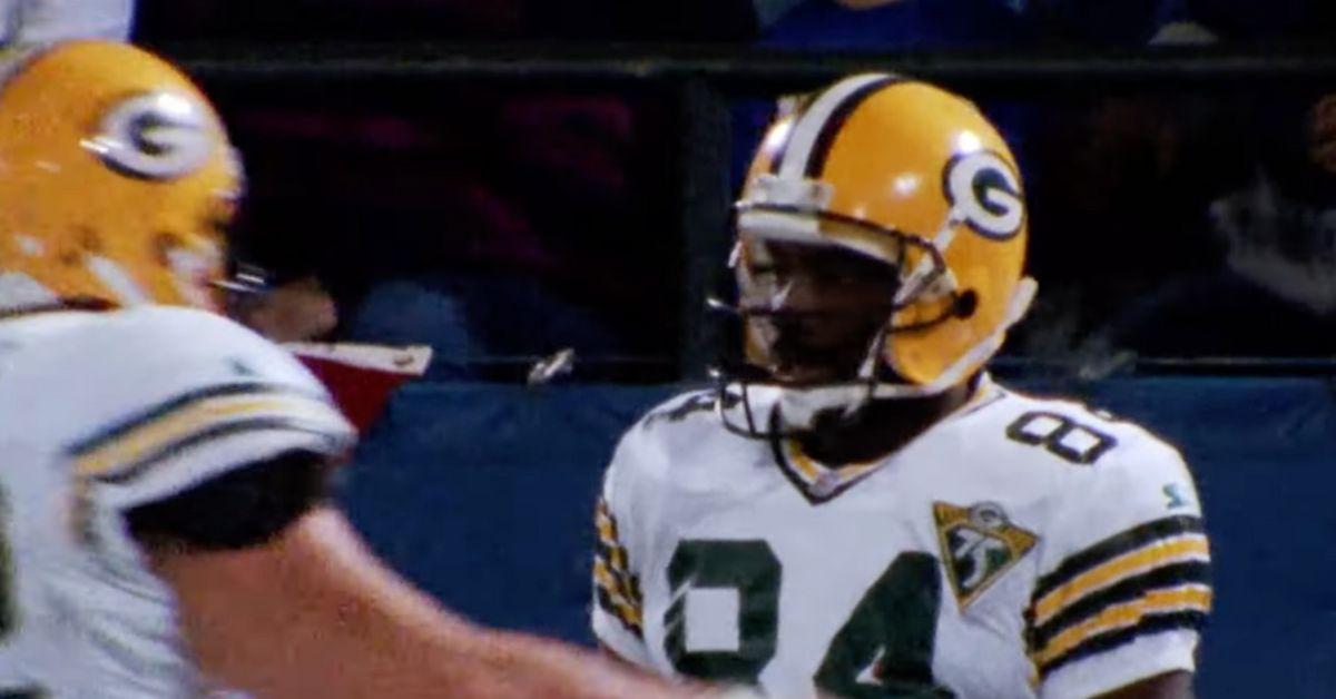 Sterling Sharpe celebrating after a touchdown catch. 