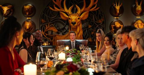 Cast of 'Million Dollar Secret' gathered at the dinner table.