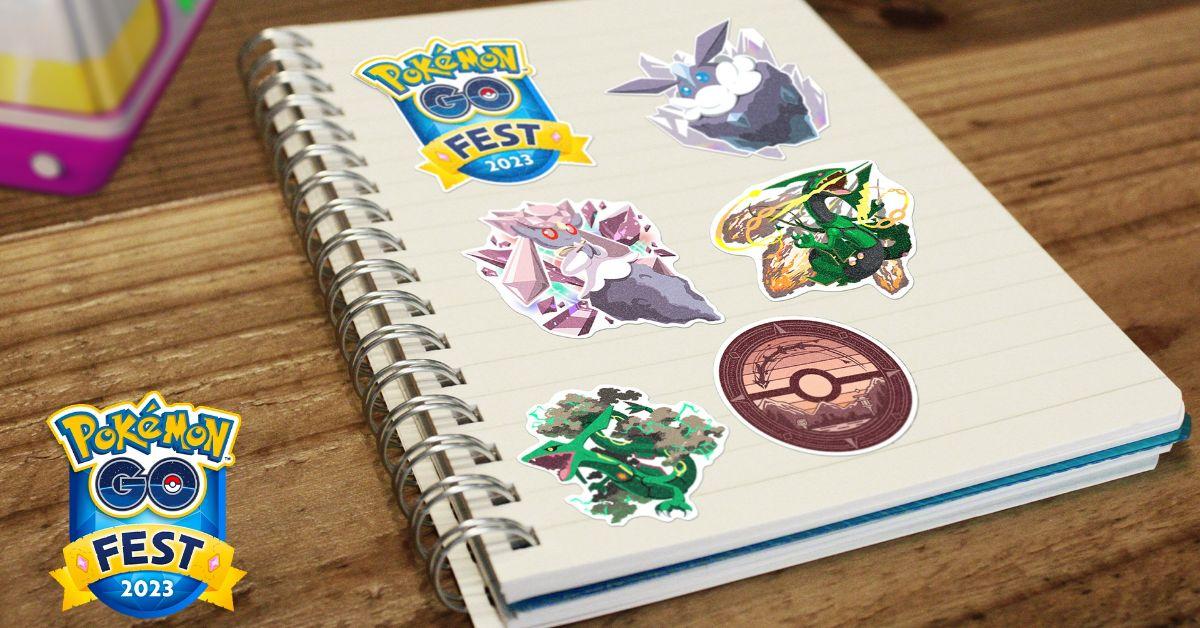 A spiral notebook with Pokémon GO Fest 2023 stickers.