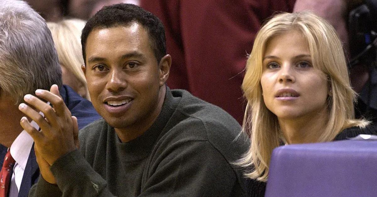 Tiger Woods and Elin Nordegren attend basketball game.