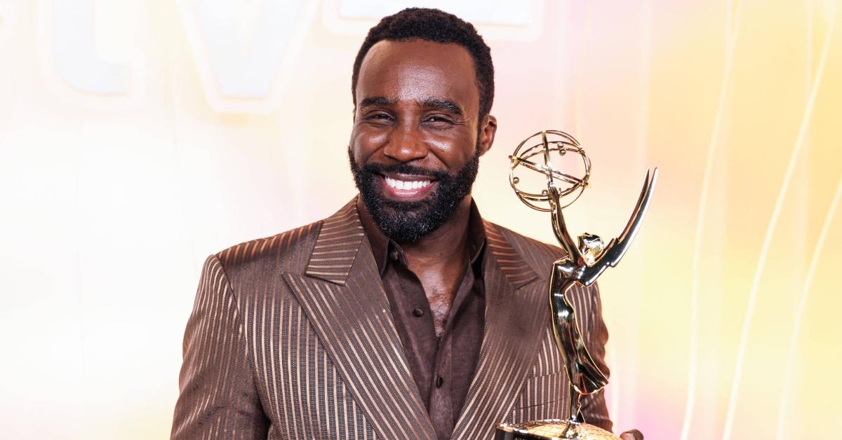Tramell Tillman holding his Emmy for his win for 'Severance.'