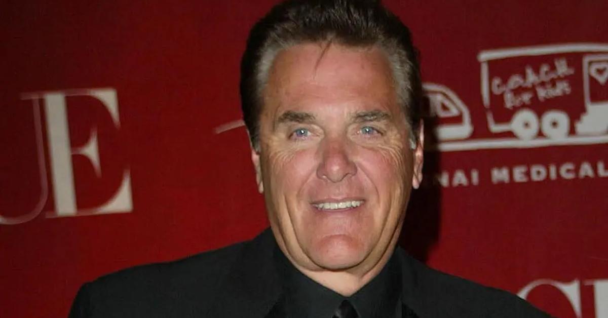 Chuck Woolery at a red carpet event.