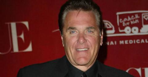 Chuck Woolery at a red carpet event.