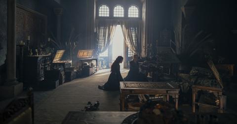 Alicent and Helaena crowched down in a room of the palace