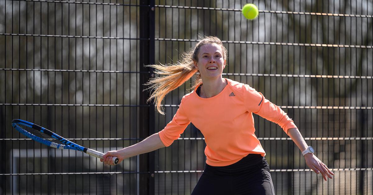 A woman takes part in a tennis lesson at Highbury Fields tennis courts on March 29, 2021 in London, England.