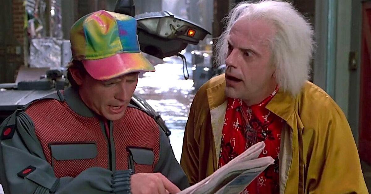 Marty and Doc looking at a paper in 'Back to the Future 2.'