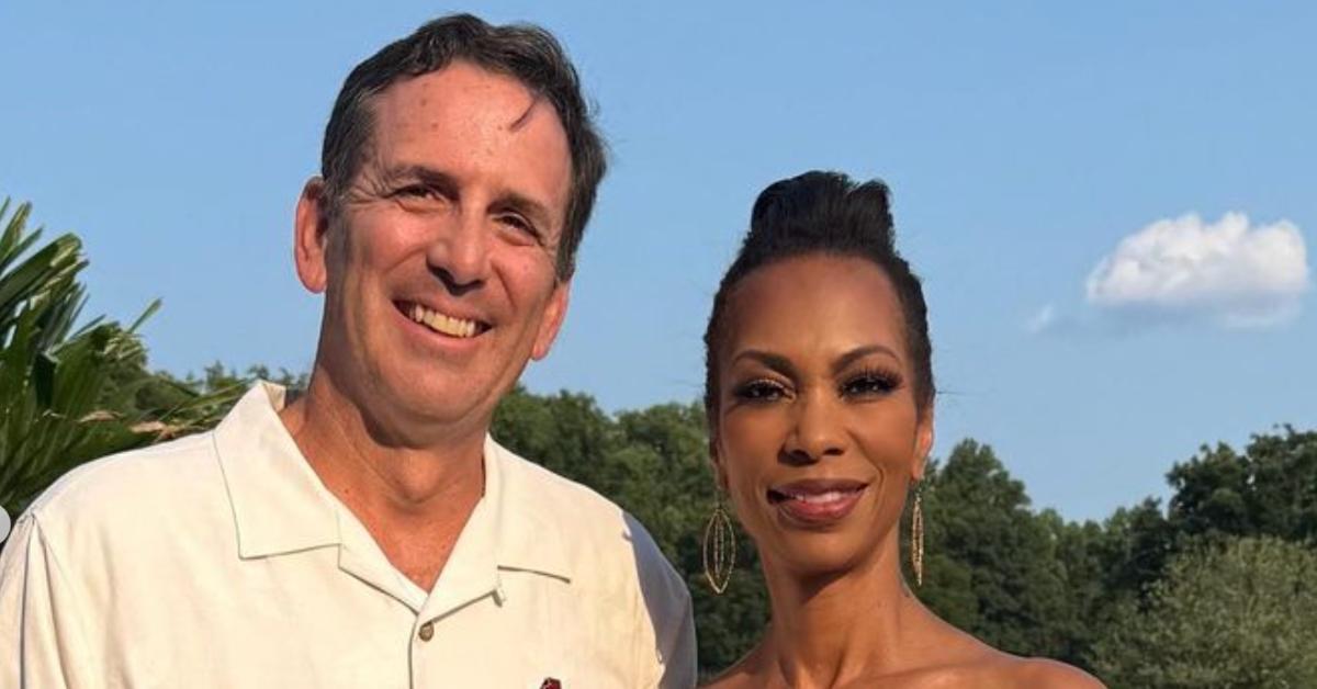 Harris Faulkner and husband Tony Berlin pose outside