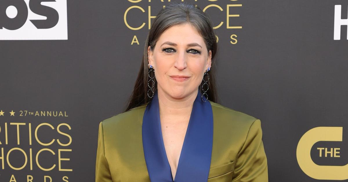 Mayim Bialik wearing a blue and 