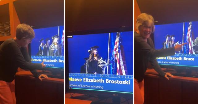 A woman reacts to the graduation speaker messing up graduates' names