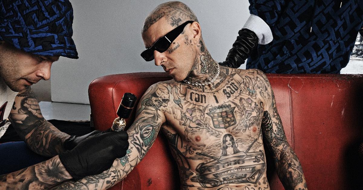 Travis Barker gets a tattoo during an ad campaign