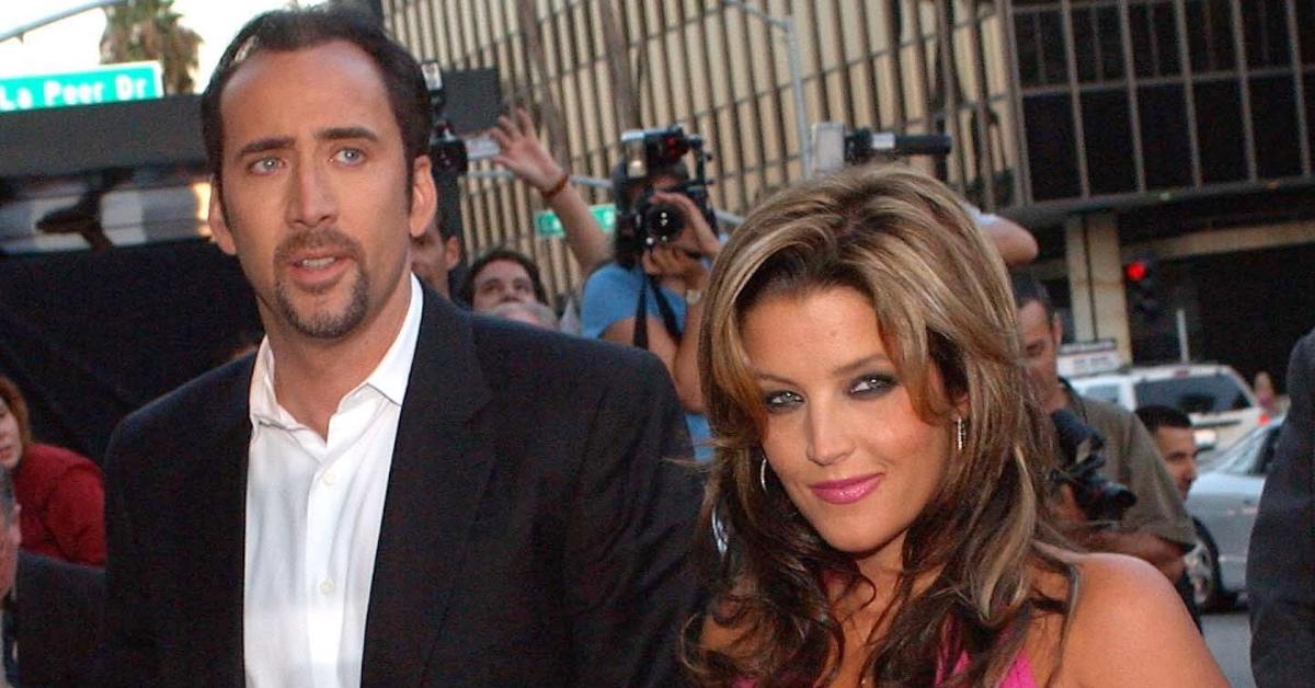 Nicolas Cage arriving at the US premiere of his film 'Captain Corelli's Mandolin' with Lisa Marie Presley