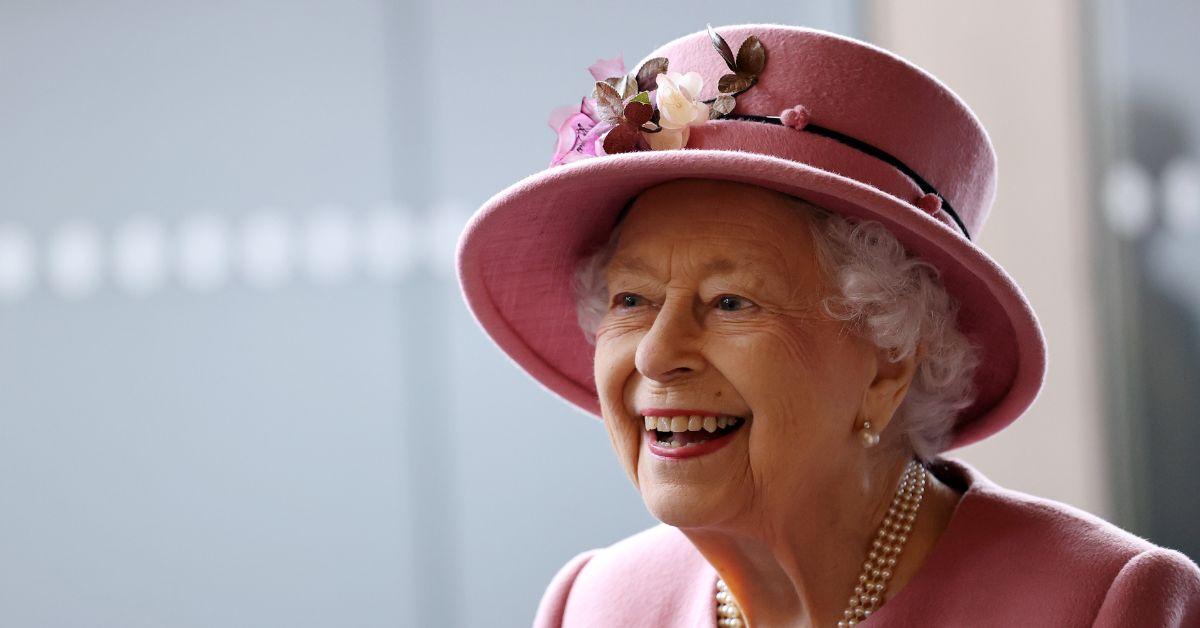 Queen Elizabeth II smiling while attending an event.