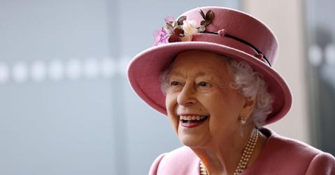 Queen Elizabeth II smiling while attending an event.
