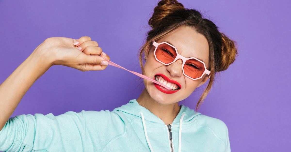 Portrait of a funny young girl with bright makeup