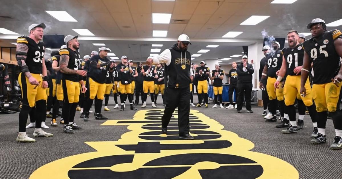 Mike Tomlin with the Steelers in their locker room.