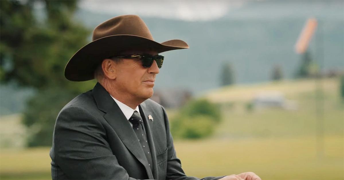 Kevin Costner in a cowboy hat and suit in 'Yellowstone.' 