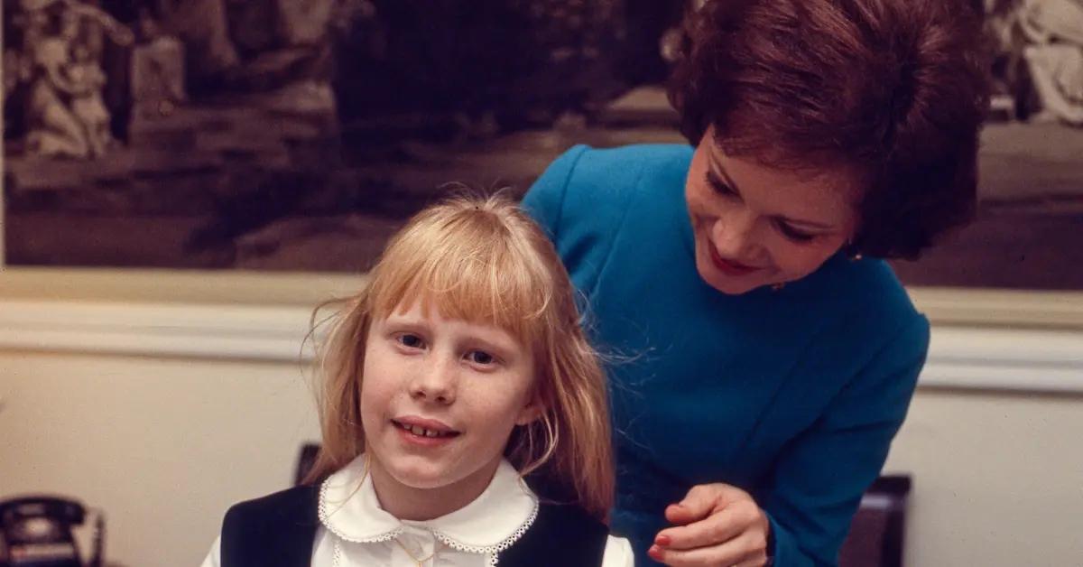 First Lady Rosalynn Carter helps Amy Carter prepare for President Jimmy Carter's Inaugural Parade in 1977.