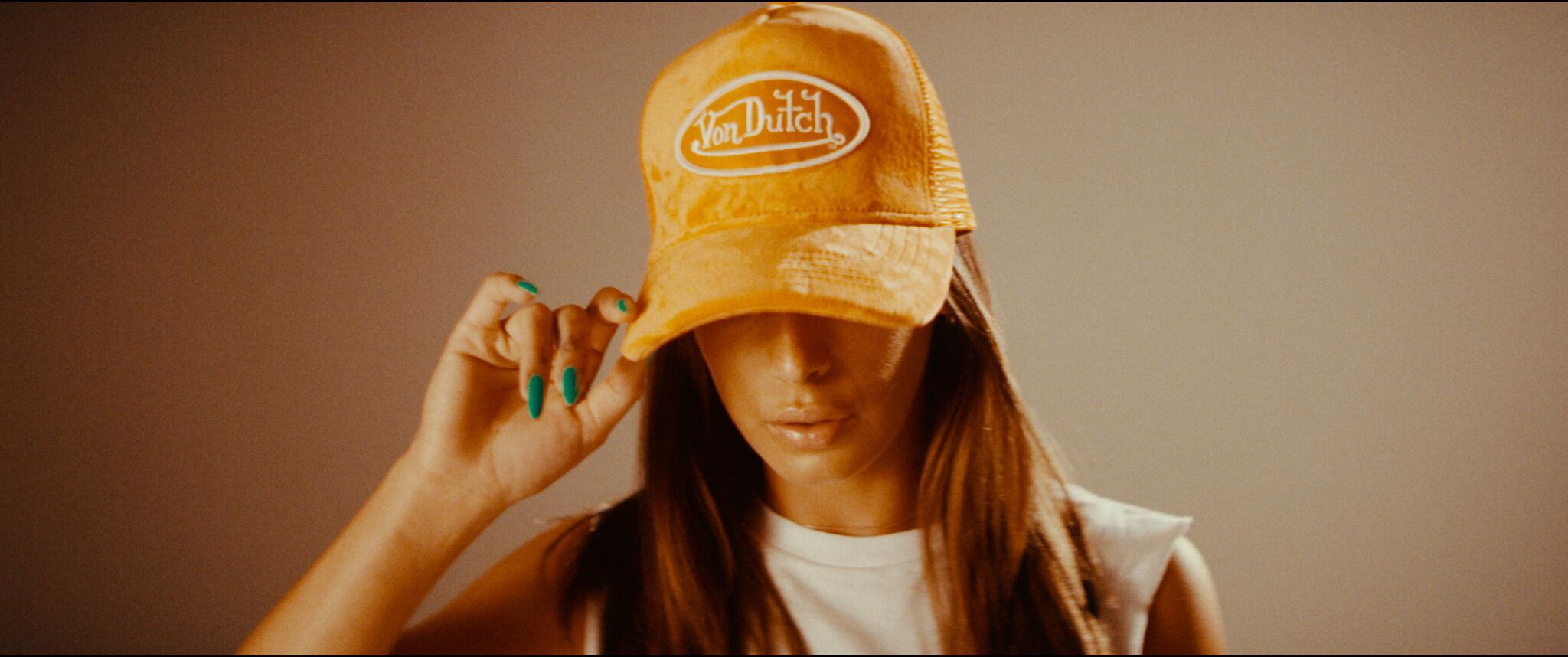 Woman wearing Von Dutch hat