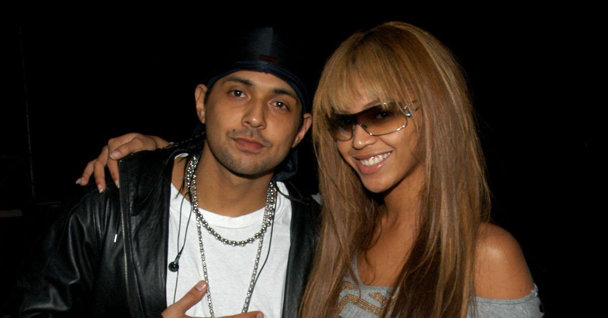 (l-r): Sean Paul and Beyonce embracing 