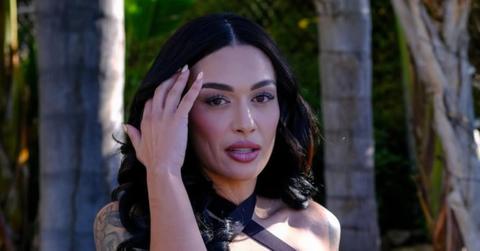 Amani Jlassi posing in a black dress from '90 Day Fiancé4'.