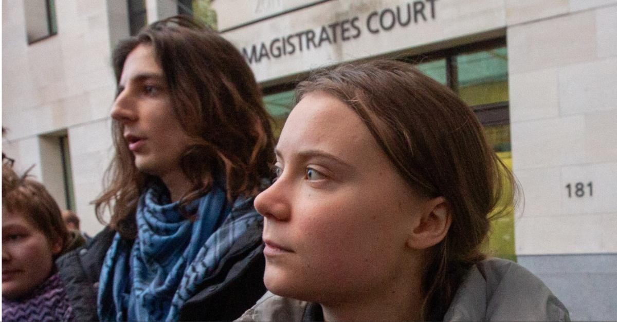 Chris Kebbon and Greta Thunberg outside the Westminster's Magistrates Court in London. 