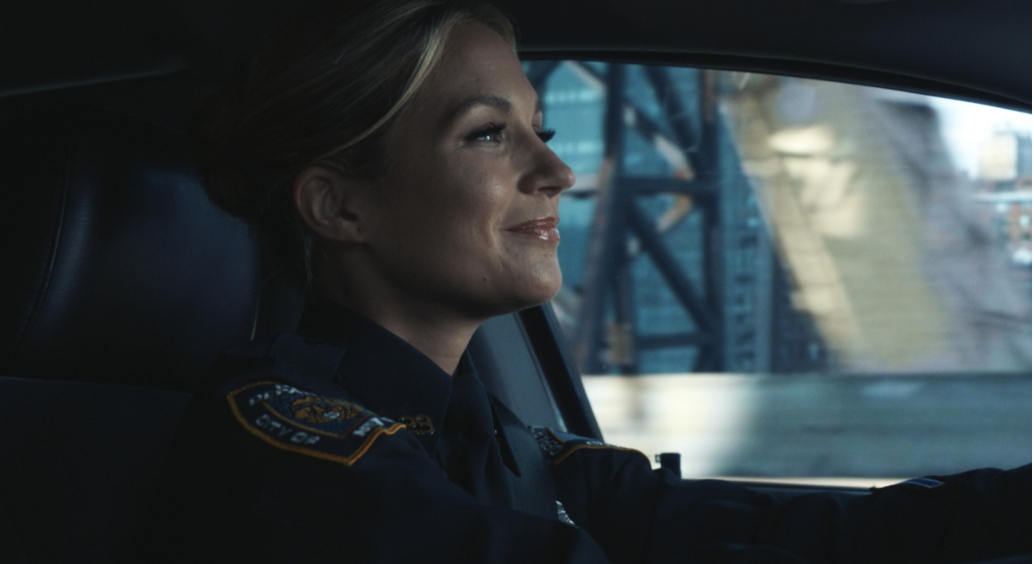 Officer Eddie Janko in her squad car on 'Blue Bloods'.