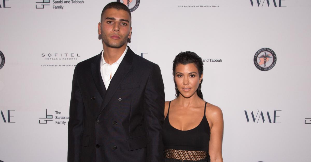 Younes Bendjima and Kourtney Kardashian attending an event together