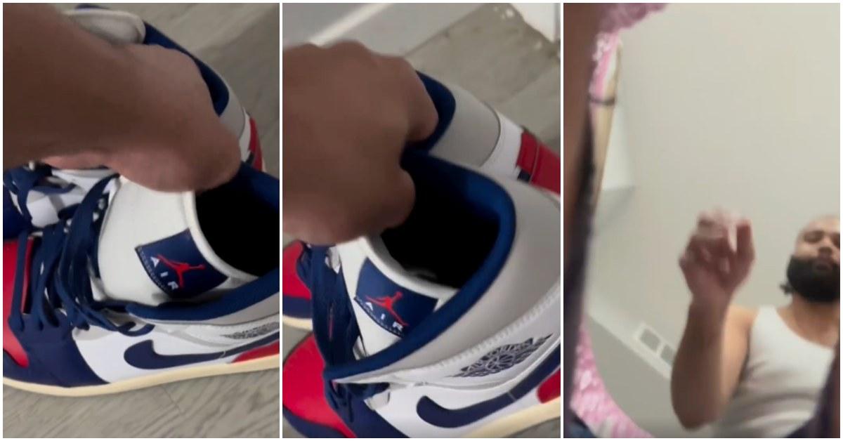 Man throws away Jordan sneakers.