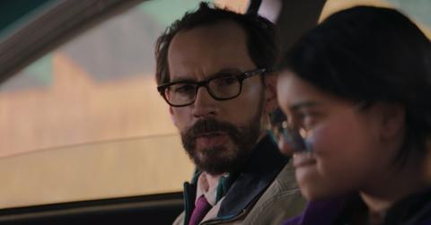 (L-R) Ms. Marvel's driving instructor (Randy Havens) and Kamala Khan/Ms. Marvel (Iman Vellani)
