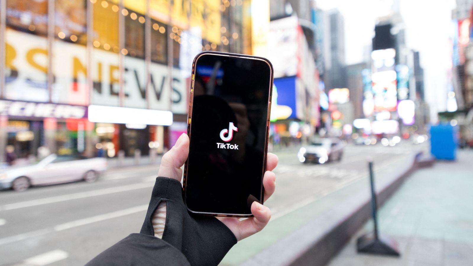 The TikTok logo on a phone screen. 