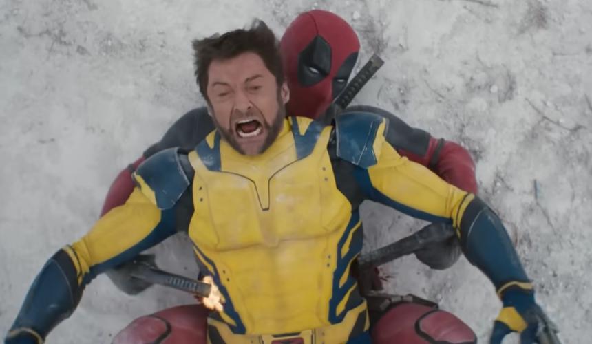 Deadpool and Wolverine fighting each other in the desert.