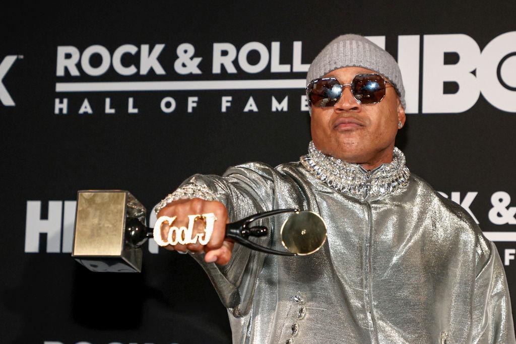 LL Cool J with his Rock n' Roll Hall of Fame award