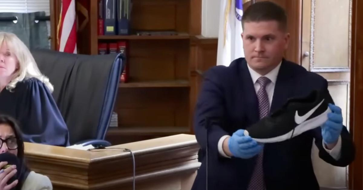  Massachusetts State Police trooper Yuriy Bukhenik holds up a shoe during Karen Read retrial 