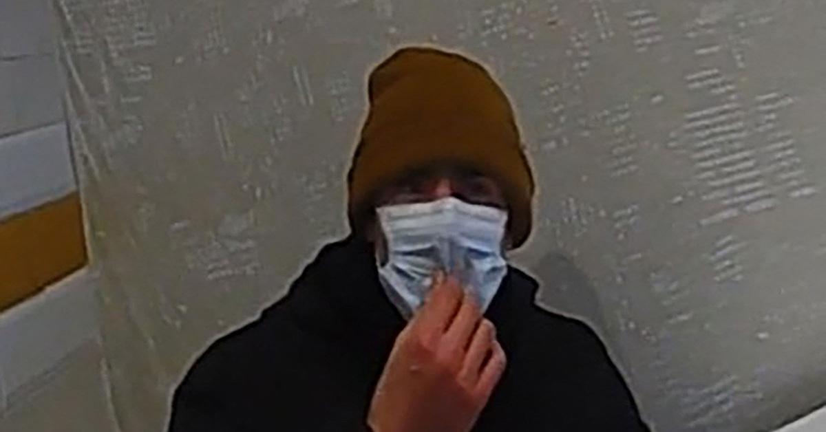 Luigi Mangione in grainy surveillance footage and a mask. 