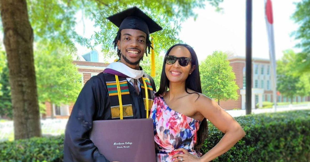 (l-r): Destin Tucker and Azja Pryor smiling at his graduation.