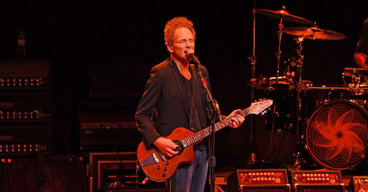 Lindsey Buckingham performing on stage in 2022. 