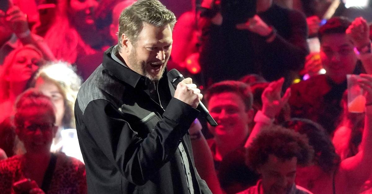 Blake Shelton singing on a stage