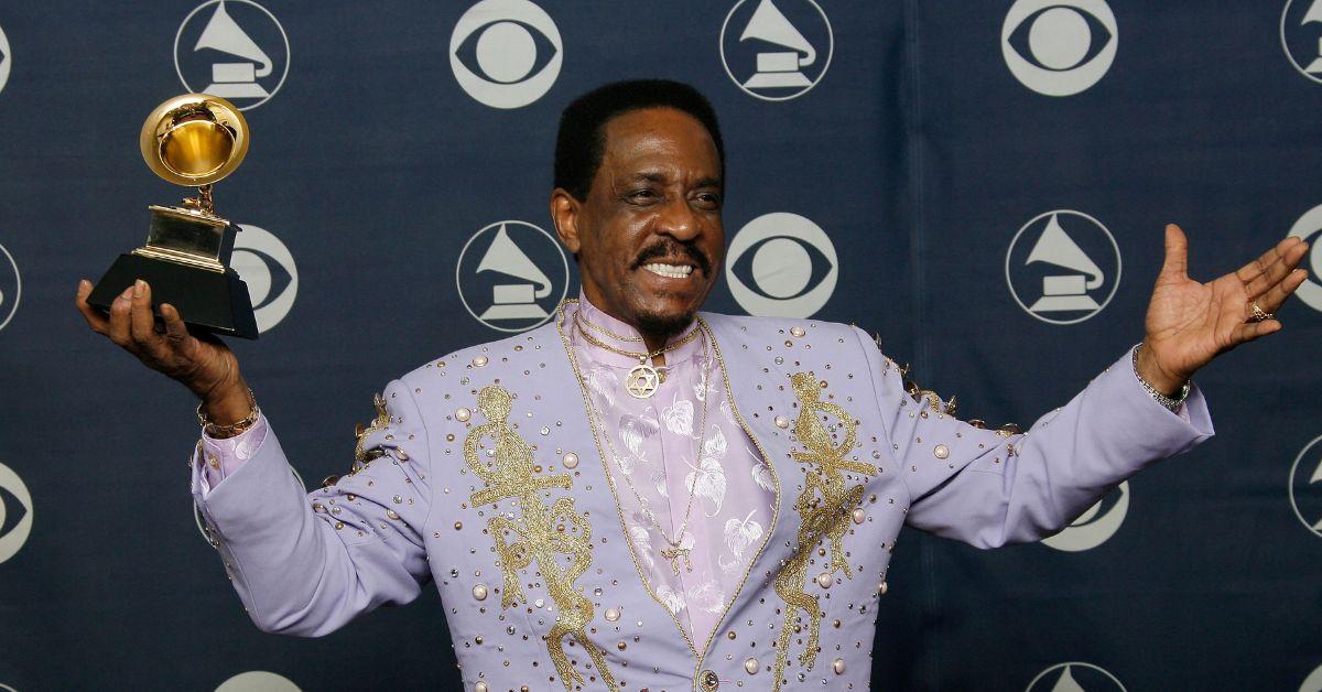 Ike Turner smiling and holding a Grammy in February 2007.