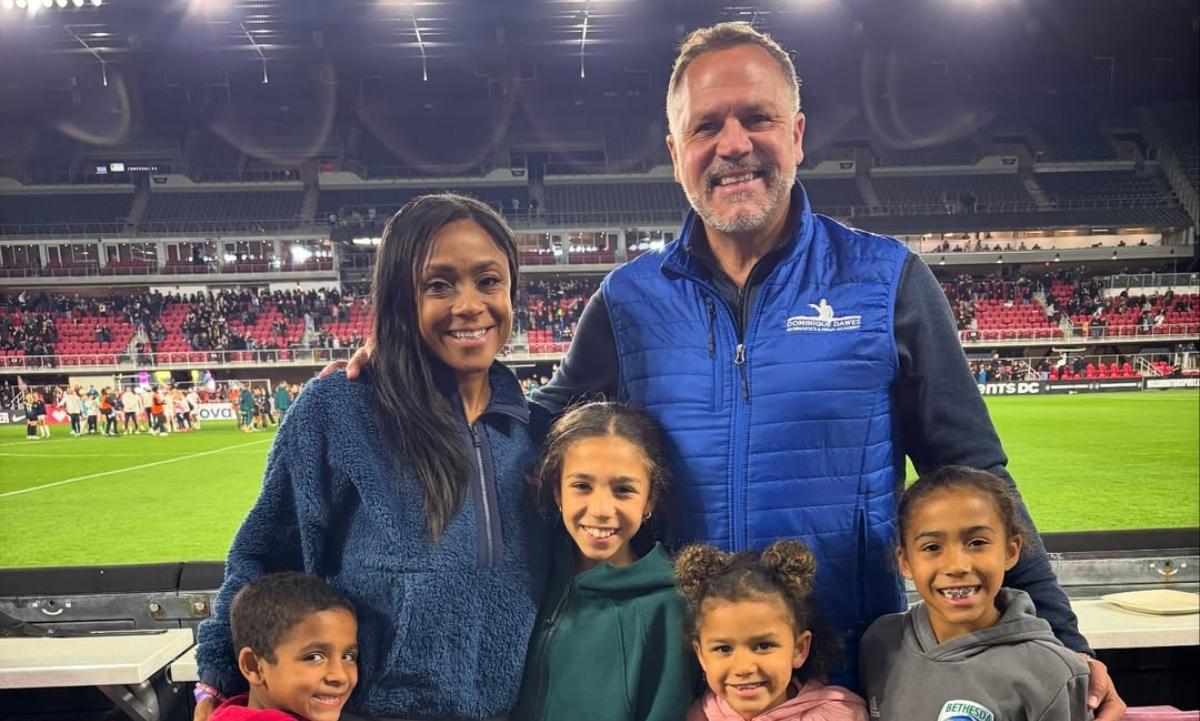 Dominique Dawes and her family at a soccer game.