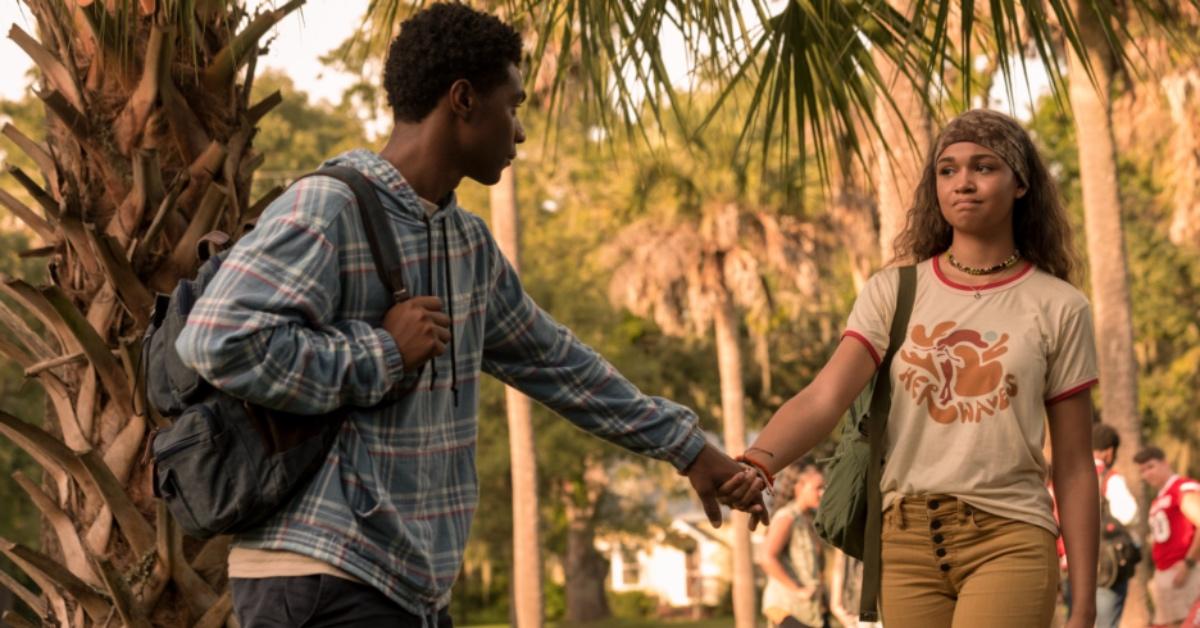 Pope and Kiara walk into school together in 'Outer Banks' Season 2. 