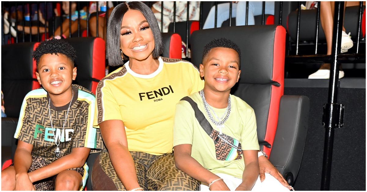 (l-r): Ayden Nida, Phaedra Parks, and Dylan Nida attending an event together.