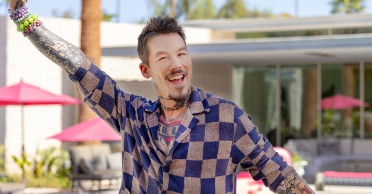 David Bromstad standing by the pool.