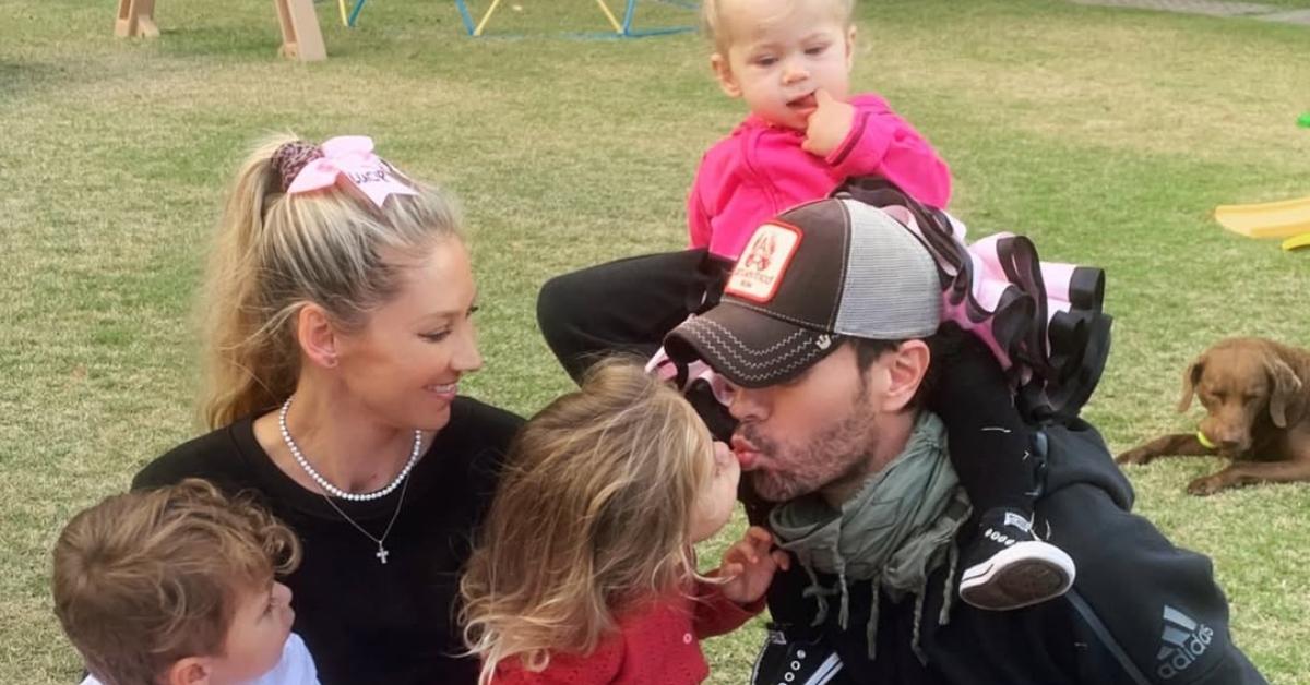 (l-r): Anna Kournikova and Enrique Iglesias with their kids