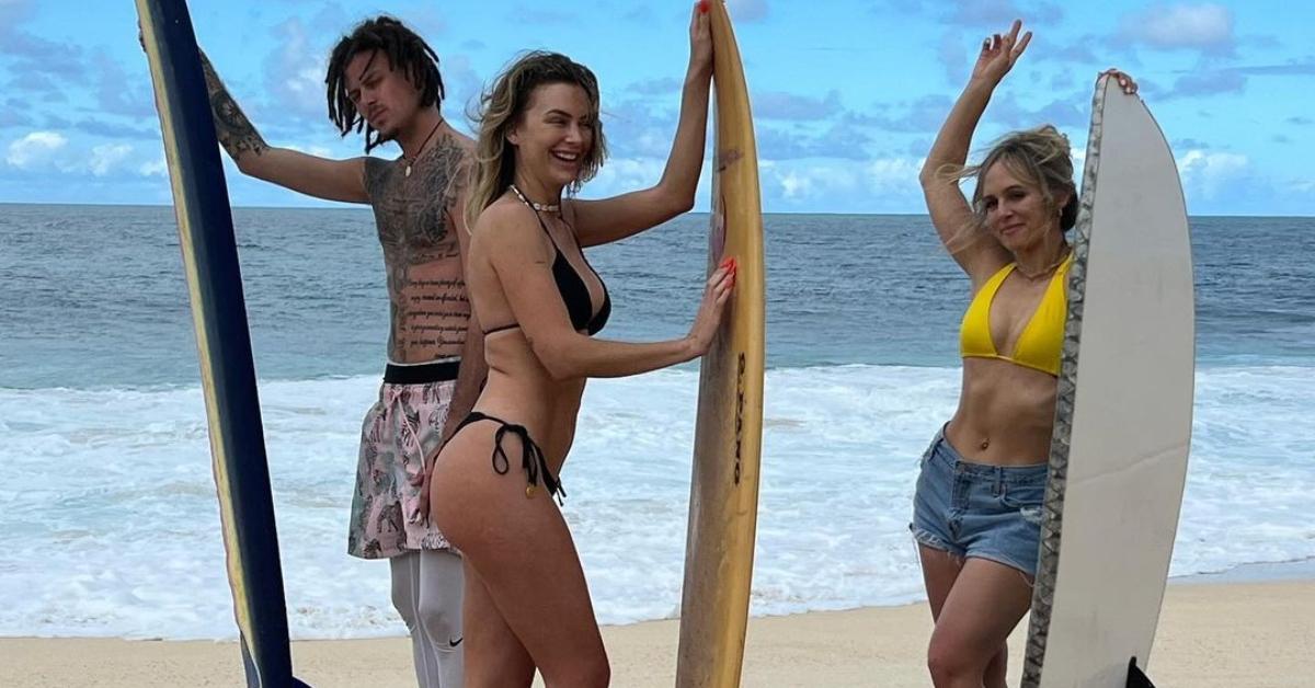 Easton, Lala, and Jessica with surf boards