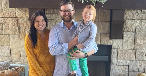 Amy Duggar with her husband and son