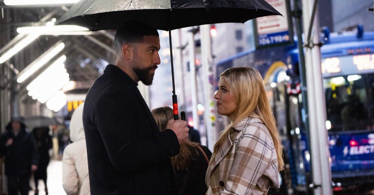 OA and Gemma standing under an umbrella in Season, Episode 14 of 'FBI'.